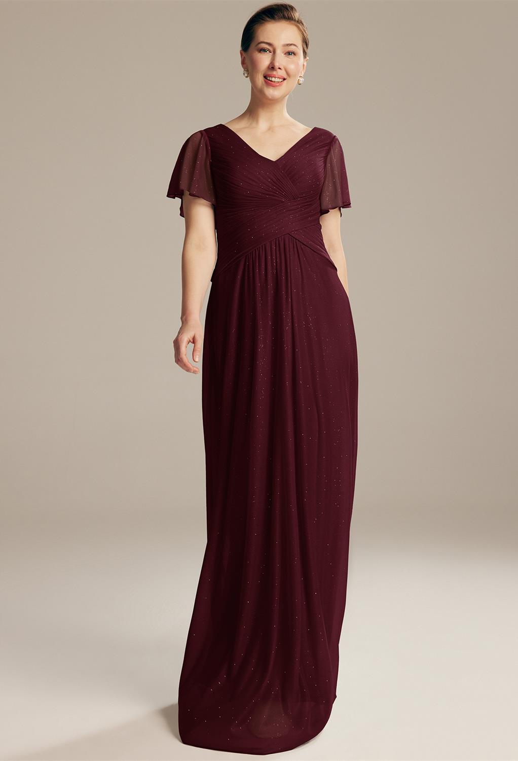 AW  Shona dress is made with a high-quality glitter mesh fabric. It's crafted as an elegant A-line floor length with an attractive V-neck neckline. The beautiful bust area is designed with strapless butterfly sleeves. Fully lined with a built-in b