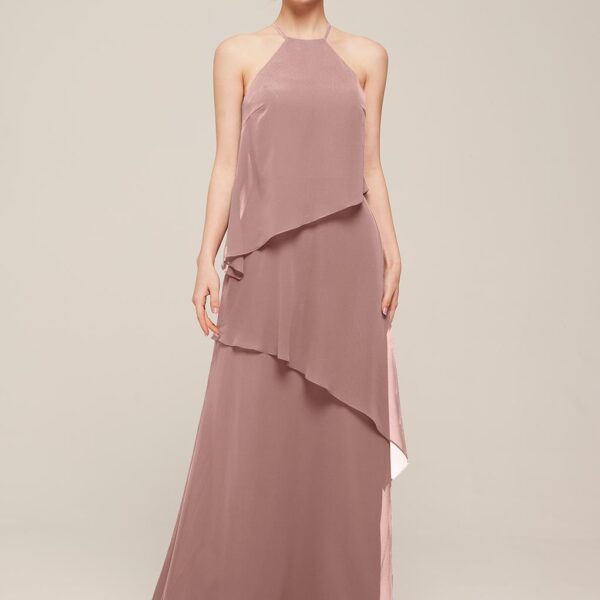 The Valencia dress offers a layered look that is purely perfect. The dress features a light and airy look that you'll fall in love with each time that you catch a glimpse of yourself in a mirror. Bared shoulders and an open back make this dress a