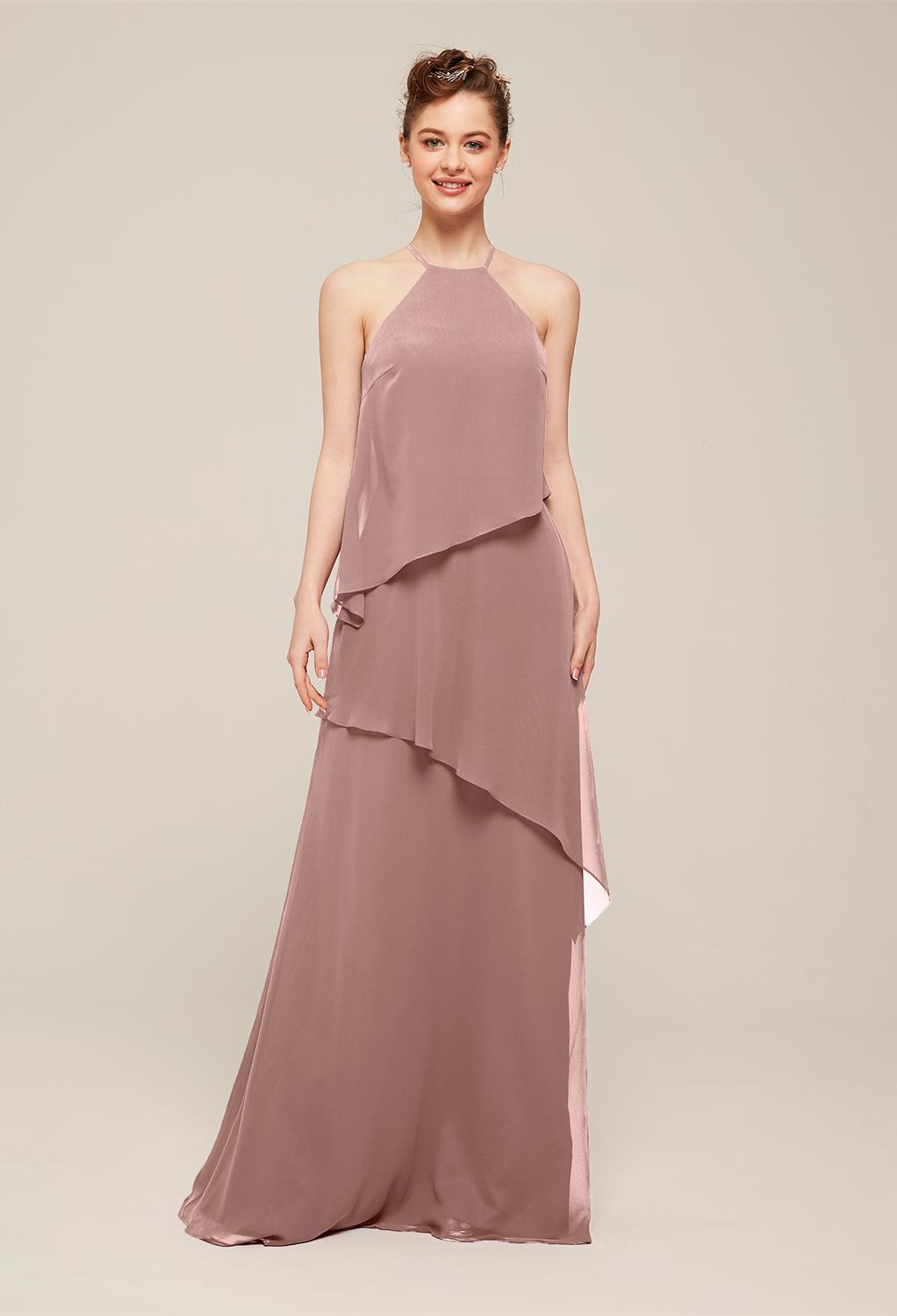 The Valencia dress offers a layered look that is purely perfect. The dress features a light and airy look that you'll fall in love with each time that you catch a glimpse of yourself in a mirror. Bared shoulders and an open back make this dress a