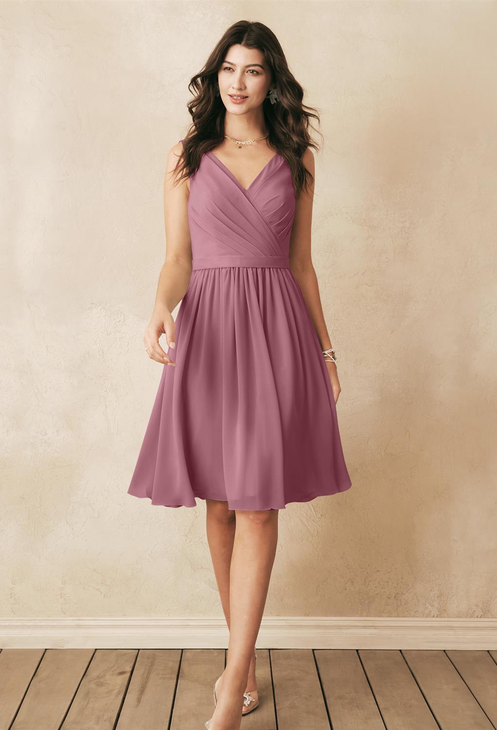 the Vivien dress offers a flirty charm that you'll adore. The plunging neckline and flattering bodice all you to look as elegant as you truly are. The pleated skirt of the dress offers great movement with every step that you