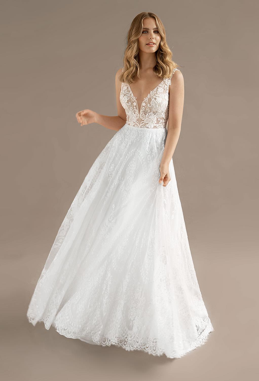 with illusion fabric to protect your modesty. Floral applique embellishments cover the beautifully designed figure-hugging bodice. The pleated lace skirt of the Whitney dress adds the movemen