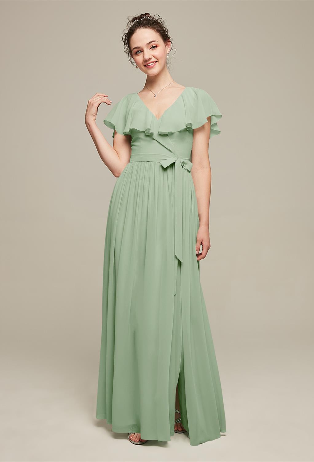 with ruffle sleeves that bring a romantic feel to this dress. The floor length skirt and sweetheart neckline add great character to the dress