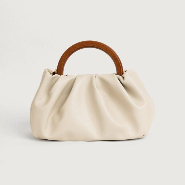 Category: HandbagMaterial: PUSilhouette: SquareDisclosure: ZipStrap: Undetachable Strap (Unadjustable) Fashion keywords: Handbag