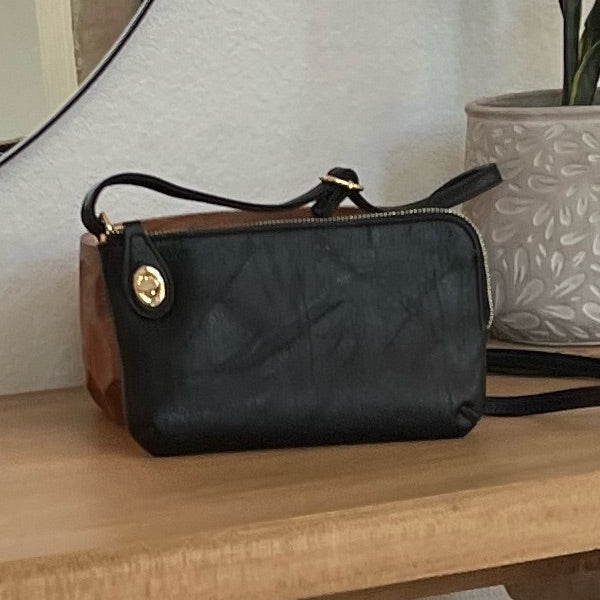 Now you can build your perfect bag! Pick your favorite color Nikki crossbody bag and then pick your favorite style strap to build the perfect bag. All straps are interchangeable!Our beautiful Nikki vegan leather Crossbody  from the Threaded Pear is th