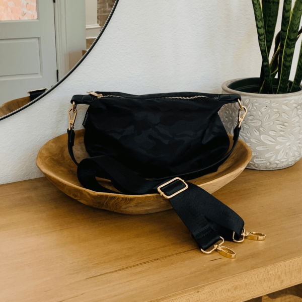 This adorable yet very functional nylon compact crossbody is the perfect  bag for your quick zips around town in style.This stunning bag features a space saving design perfect for your phone