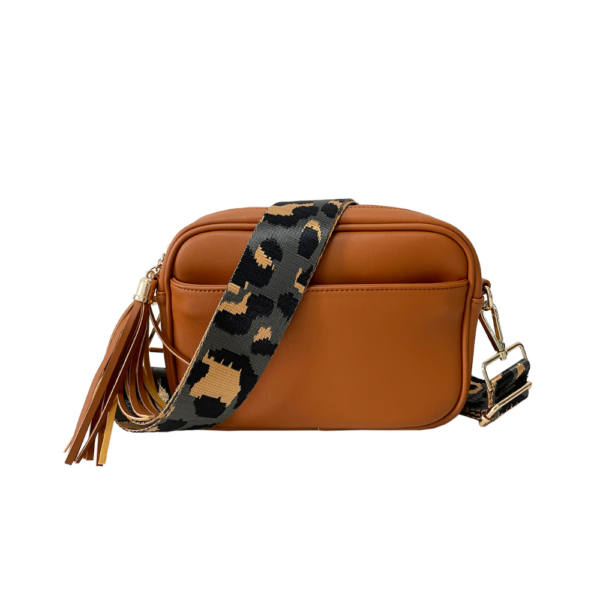 Now you can build your perfect bag! Pick your favorite color Crossbody bag and then pick your favorite style strap to build the perfect bag. All straps are interchangeable!Our beautiful Courtney vegan leather Crossbody from the Threaded Pear is the perfec