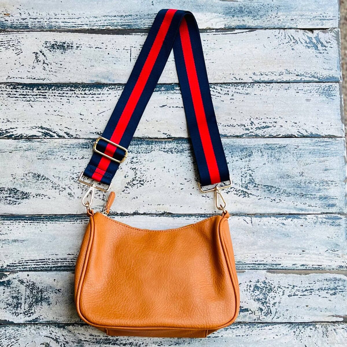 Now you can build your perfect bag! Pick your favorite color Lucy Handbag and then pick your favorite style strap to build the perfect bag. All straps are interchangeable!Our beautiful Vegan Leather handbag from the Threaded Pear is the perfect take any