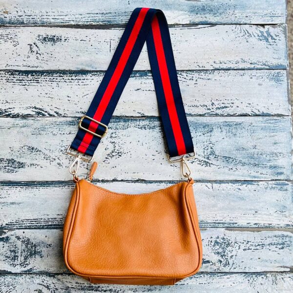 Now you can build your perfect bag! Pick your favorite color Lucy Handbag and then pick your favorite style strap to build the perfect bag. All straps are interchangeable!Our beautiful Vegan Leather handbag from the Threaded Pear is the perfect take any