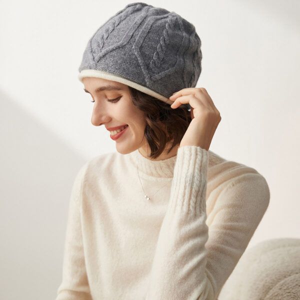 Stay warm and stylish this winter with our Cozy and Stylish Cable Knit Beanie. Crafted from 100% high-quality cashmere