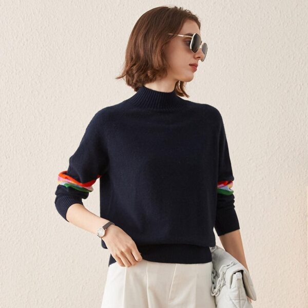 Add a pop of color to your winter wardrobe with this chic cashmere pullover sweater. Crafted from luxurious soft cashmere