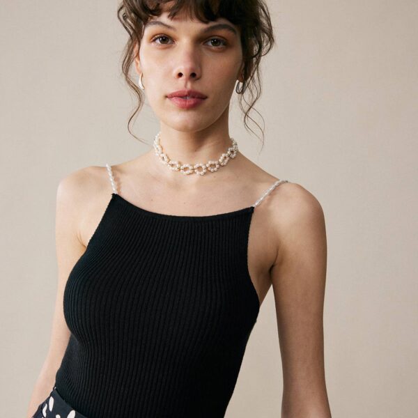 Fabric:This cami is made of 100% Tencel Lyocell. TENCEL Lyocell fibers