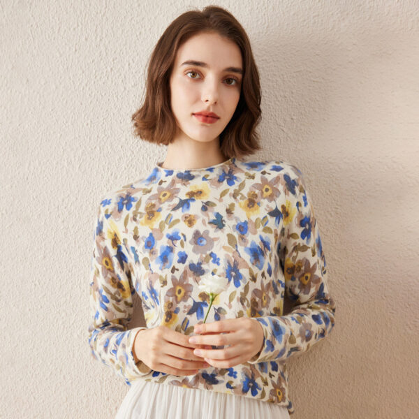 Embrace the beauty of nature with our Elegant Floral Print Sweater. This sophisticated sweater features a delicate floral pattern in soft
