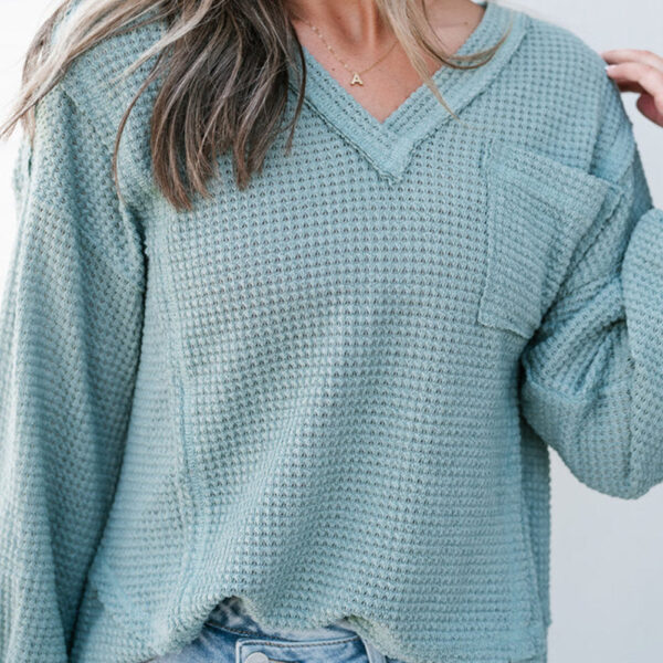 A comfortable waffle knit top for the new seasonIt features a v-neck