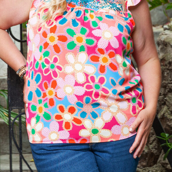 Effortlessly create a stylish and cute vibe in this Maisy Plus Size Flutter Sleeve Tank Top adorned with colorful flowers and delightful details like a round neck and ruffled sleeves. Comfort and versatility come together perfectly for curvy ladies