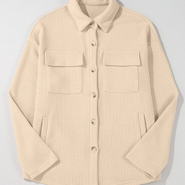 This corduroy jacket brings texture and warmth to your wardrobe. Embrace a timeless and versatile style with its solid color design. The buttoned closure adds a touch of polish and structure. And don't forget the chest pockets for added functionality and