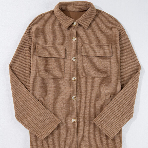 This corduroy jacket brings texture and warmth to your wardrobe. Embrace a timeless and versatile style with its solid color design. The buttoned closure adds a touch of polish and structure. And don't forget the chest pockets for added functionality and