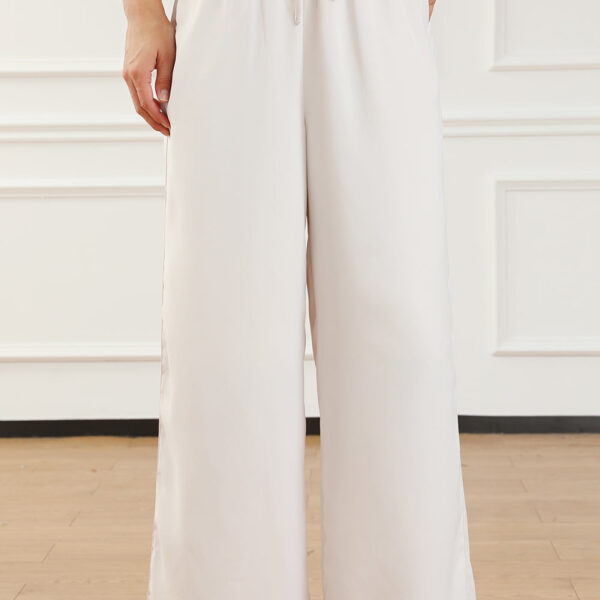 Step into these comfy pants that are perfect for all seasons! Made with a soft