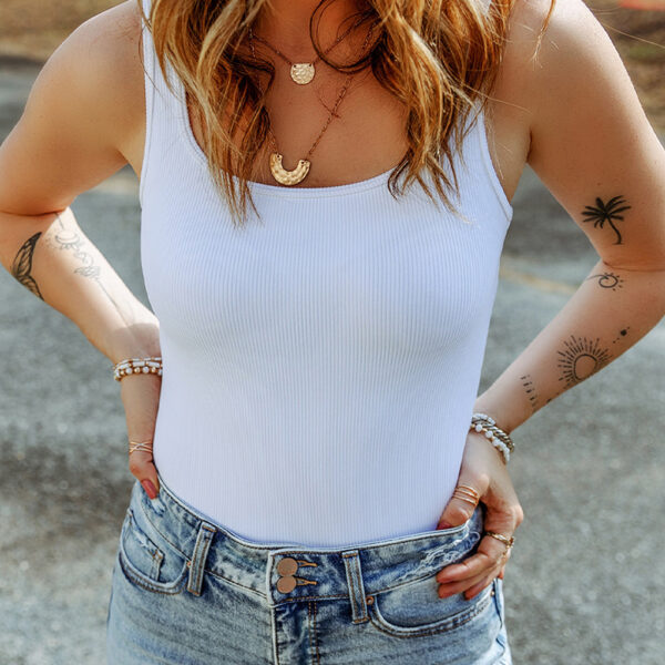 The bodysuit's ribbed knit fabric gives a comfortable and flexible fit