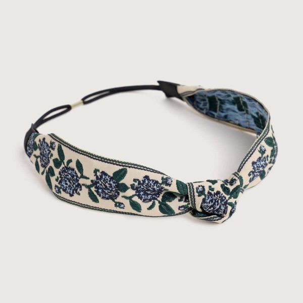 Style: BohoColor: RedDetails: Knotted Floral EmbroideredType: Floral Hair BandMaterial: Polyester