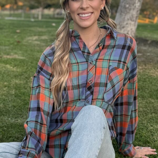 Get your retro on with this timeless plaid shirt. Its classic design has just enough vintage charm to make a statement. With a comfy loose fit