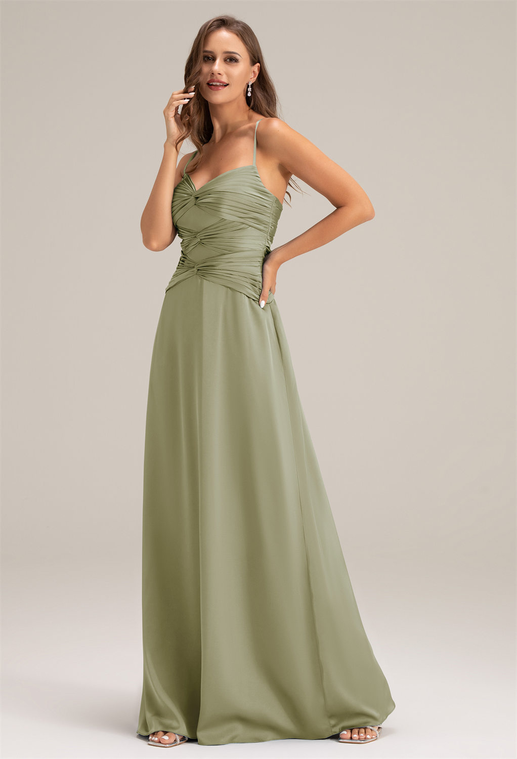 satin charmeuse bridesmaid dress. It features a sweetheart neckline and a floor-length hemline