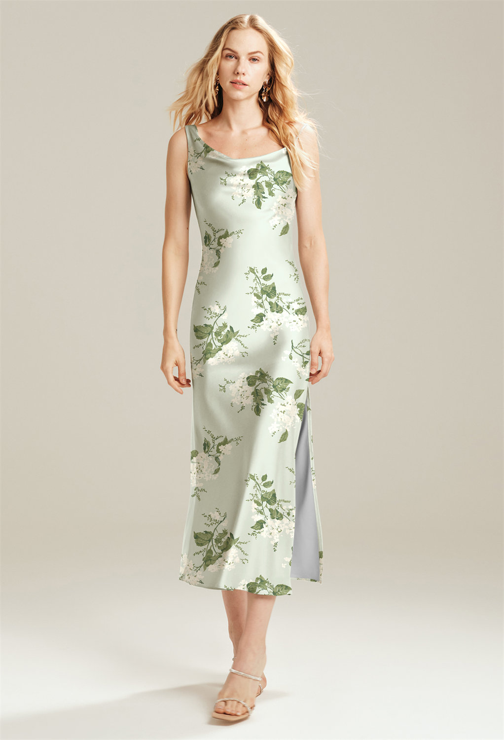 the Graziosa dress offers a pretty tea-length that youu2019ll adore each time you catch a glimpse of yourself. The sleeveless look is simply darling and makes this dress a great option for wearing to a summertim