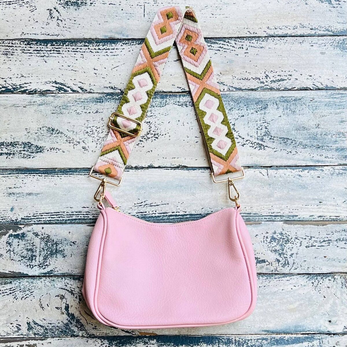 Now you can build your perfect bag! Pick your favorite color Lucy Handbag and then pick your favorite style strap to build the perfect bag. All straps are interchangeable!Our beautiful Vegan Leather handbag from the Threaded Pear is the perfect take any