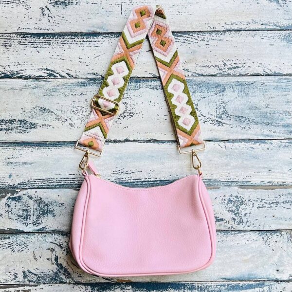 Now you can build your perfect bag! Pick your favorite color Lucy Handbag and then pick your favorite style strap to build the perfect bag. All straps are interchangeable!Our beautiful Vegan Leather handbag from the Threaded Pear is the perfect take any