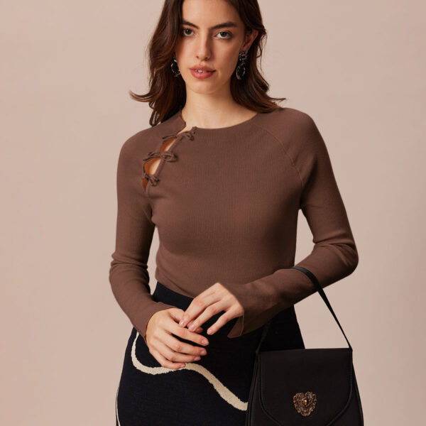 Fabric:This Ribbed Top is made of Viscose. Viscose (aka rayon) is a man-made cellulosic fiber made from wood pulp. It's soft