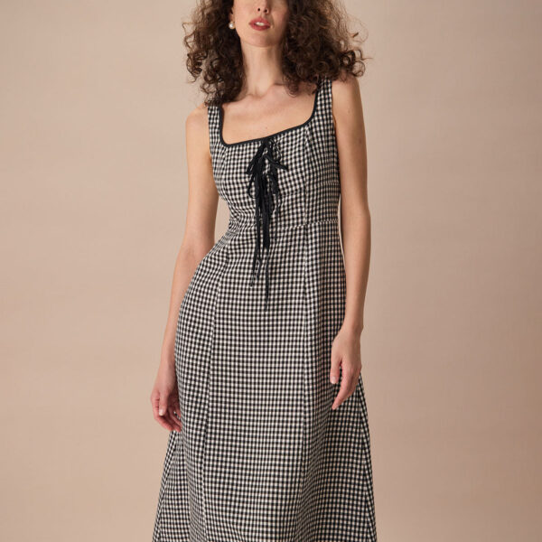 Fabric:This Button Midi Dress is made of Viscose and TENCEL™ Lyocell. Viscose (aka rayon) is a man-made cellulosic fiber made from wood pulp. It's soft