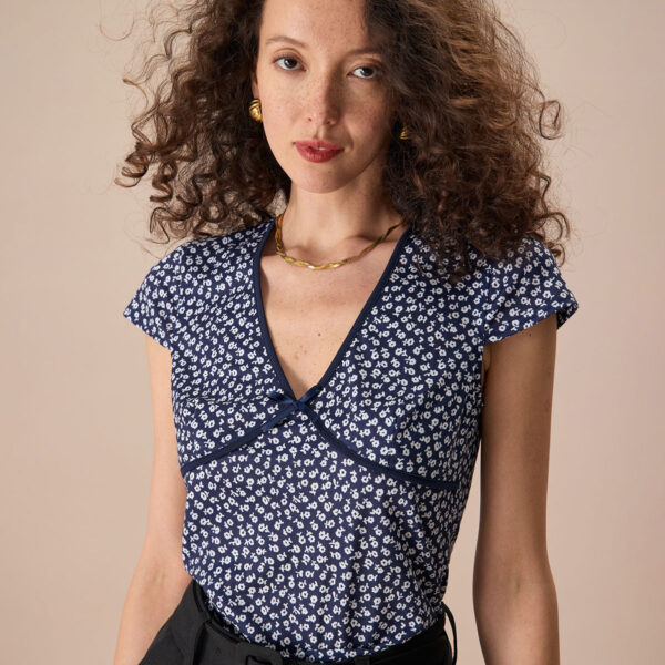 Fabric:This Floral Bowknot Tee is made of Polyester and Spandex. Polyester is an artificial fiber that feels soft