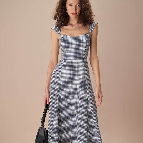 Fabric:This Plaid Midi Dress is made of Viscose and TENCEL™ Lyocell. Viscose (aka rayon) is a man-made cellulosic fiber made from wood pulp. It's soft