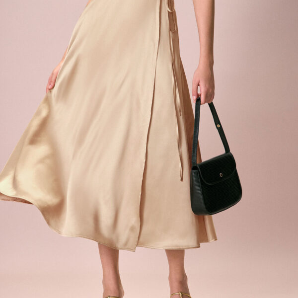 Fabric:This Midi Skirt is made of Polyester. Polyester is an artificial fiber that feels soft