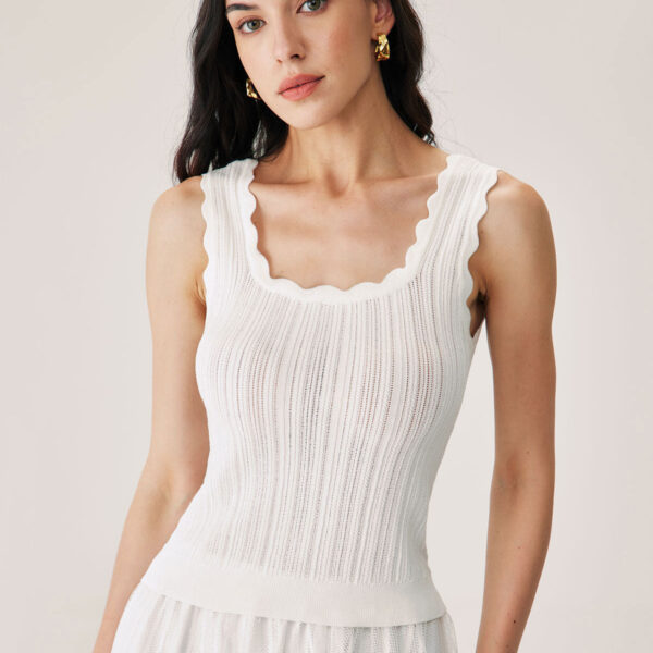 Fabric:This Hollow Tank Top is made of Viscose and Nylon. Viscose (aka rayon) is a man-made cellulosic fiber made from wood pulp. It's soft