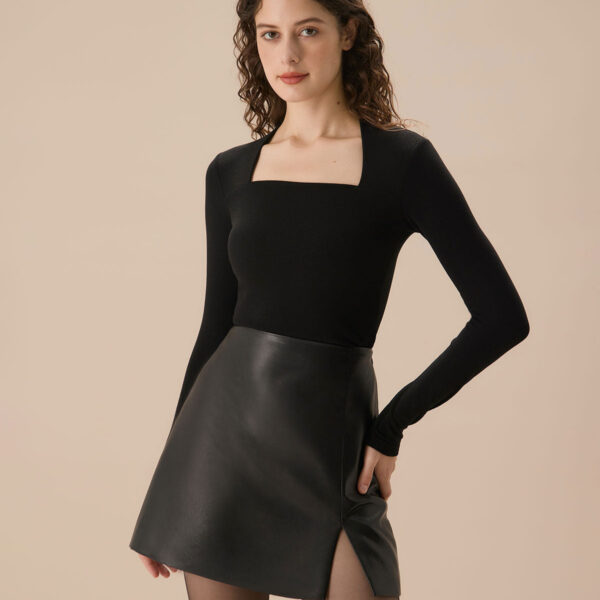 Fabric:This Black Knit Tee is made of Viscose and Polyester. Viscose (aka rayon) is a man-made cellulosic fiber made from wood pulp. It's soft