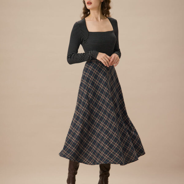 Fabric:This Plaid Midi Skirt is made of Polyester and Cotton. Polyester is an artificial fiber that feels soft