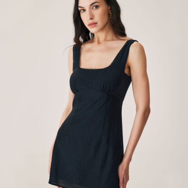 Fabric:This Textured Mini Dress is made of TENCEL and Nylon. Lyocell is a semi-synthetic fiber used to make textiles for clothing and other purposes. It is a form of regenerated cellulose made by dissolving pulp and dry jet-wet spinning. Description:Cover